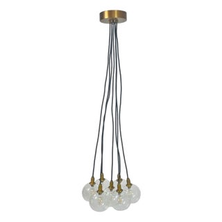 Modern 7-Light Cluster Chandelier With Oversized Glass Globes and Satin Brass For Sale