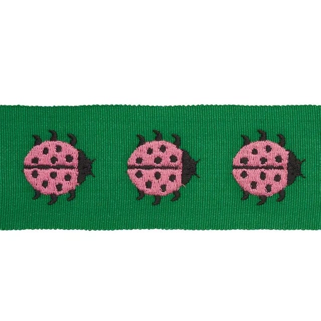 Embroidered ladybugs march along a woven cotton tape for a sunny and happy accessory that’s the height of preppy chic....