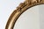 Oval Giltwood Mirror with Rococo-Style Floral Crest, 1950s For Sale - Image 4 of 11