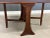 A mid century modern teak drop leaf dining table that can be easily stored. Use with one leaf extended or both. Made in...