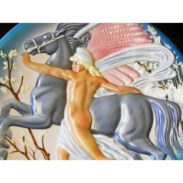 Beautifully and subtly glazed in tones of grey, green, pink and tan, this stunning Art Deco sculptural rondel depicts...