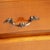 A small Louis XV-style chest of drawers, manufactured in the 20th century as a reproduction of historical models. Resting...