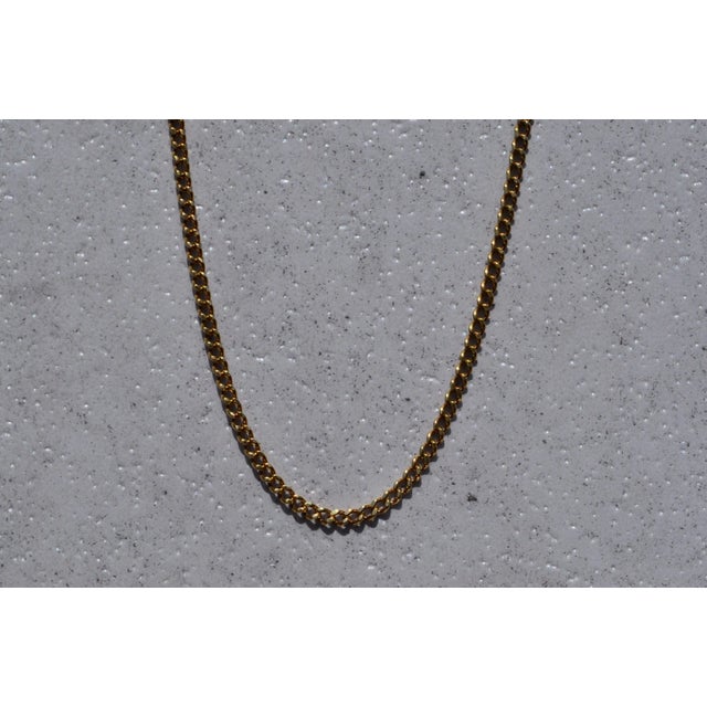 The Curb: Curb Link Style Chain in Yellow Gold. This chain features a study curb link style measuring 23 inches in length...