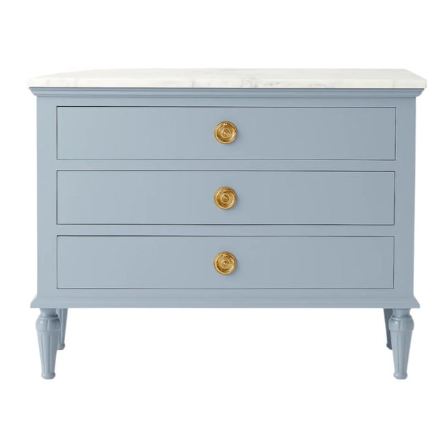 The Noeka Home 3-Drawer Royal Nightstand is a refined blend of elegance and craftsmanship, designed as part of the...