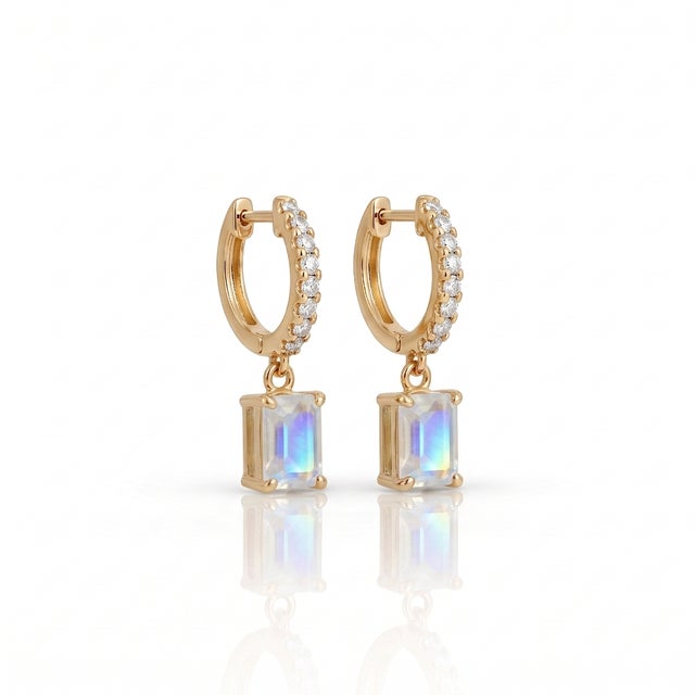 Elevate your daily ensemble with these breathtaking drop huggie hoop earrings featuring a sparkling pavé-set hoop and a...