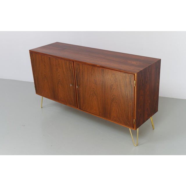 Danish Rosewood Sideboard by Carlo Jensen for Hundevad & Co, 1960s. Stunning Scandinavian Modern rosewood/palisander...