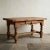 A beautifully timeworn French farmhouse table dating to circa 1900, crafted in oak with wonderfully expressive grain and a...