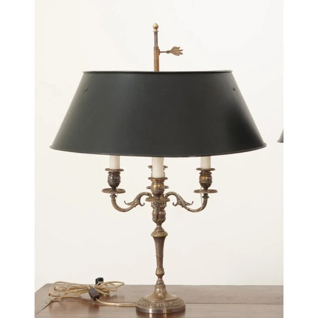 Dimensions: 28 ⅞” H x 22” W x 22” D A pair of silver-plated French candelabras made into bouillotte lamps with new black...