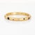 Stylish contemporary gemstone bangle bracelet crafted in sterling silver with a 24k yellow gold plate overlay. Natural...