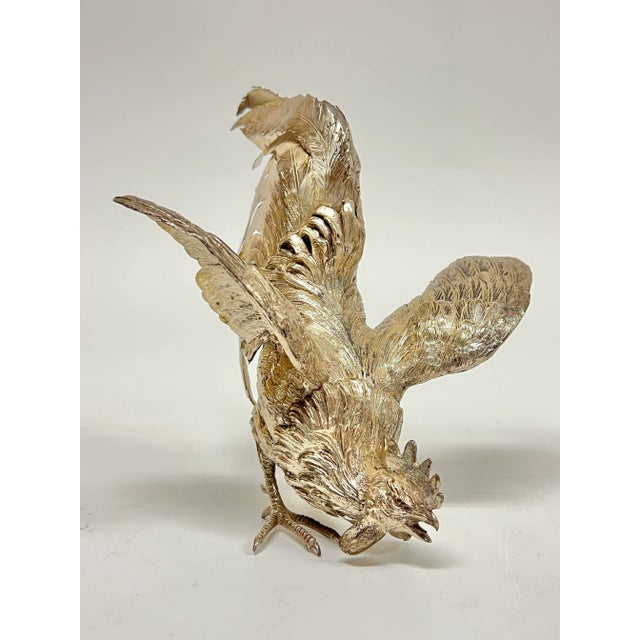 Pair of antique continental (late 19th century) silver cockerel (rooster) figurines measuring 7 1/2 and 7 3/4 inches tall...