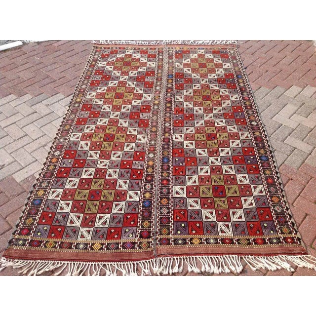 This beautiful, vintage, handwoven embroidered kilim is approximately 60 years old. It is handmade of very fine quality...