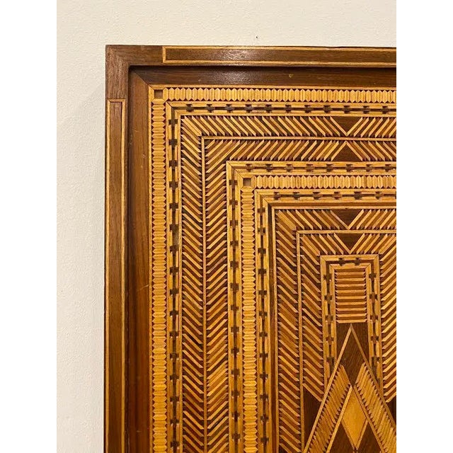 This is a very intricate and detailed wooden inlaid panel. It is in wonderful Condition and ready to be hung on a wall or...