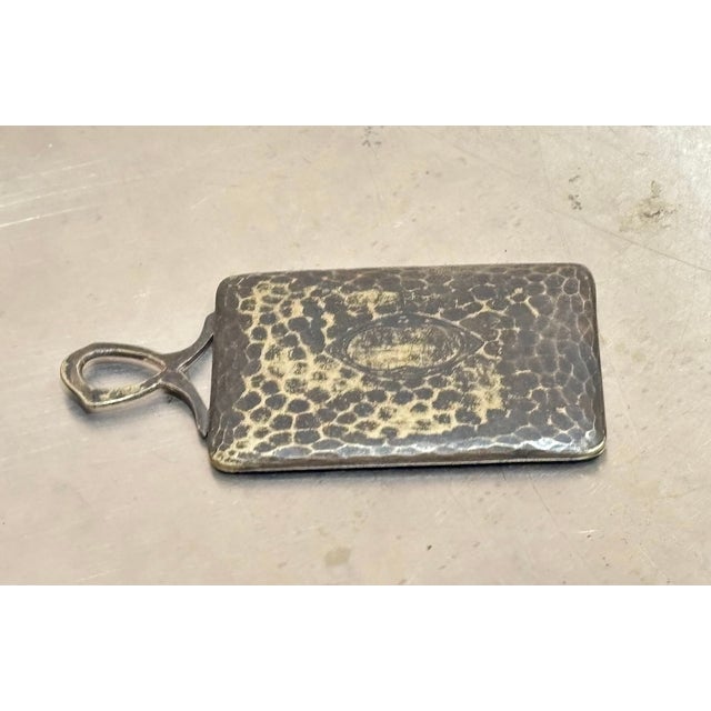 1920s-30s silverplated art deco mirror pendant w/ small mirror on one side and hammered silverplate on the other. Some...