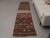 Vintage Hand-Knotted runner rug is a semi-antique vintage runner rug. The '70s Eastern region of Anatolia's unique rug is...