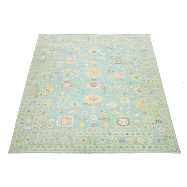 This modern Oushak-style wool rug elegantly combines contemporary design with the classic appeal of traditional Oushak...