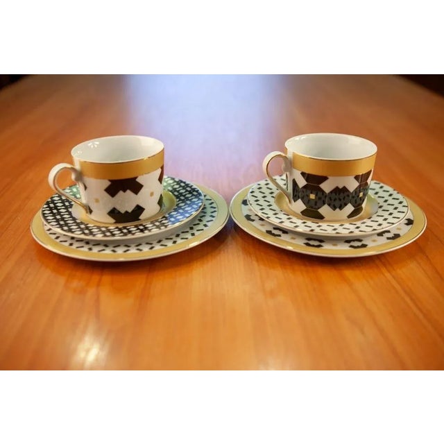 Design - Jenny PIERROT Collection - a unique combination of gold, black, and white. with its geometric shapes and...