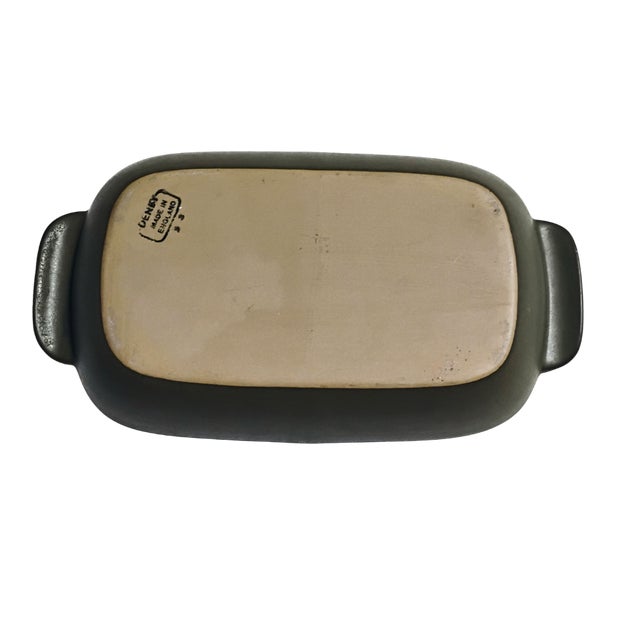 The Vintage Denby Divided Serving Dish is a charming piece of stoneware originating from England in the mid-century....