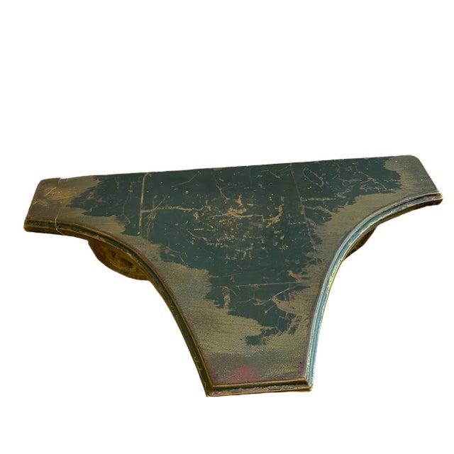 Gorgeous gilded wall shelf. Architectural corbel painted dark green and gilded. Ready to hang. Small repair has been...