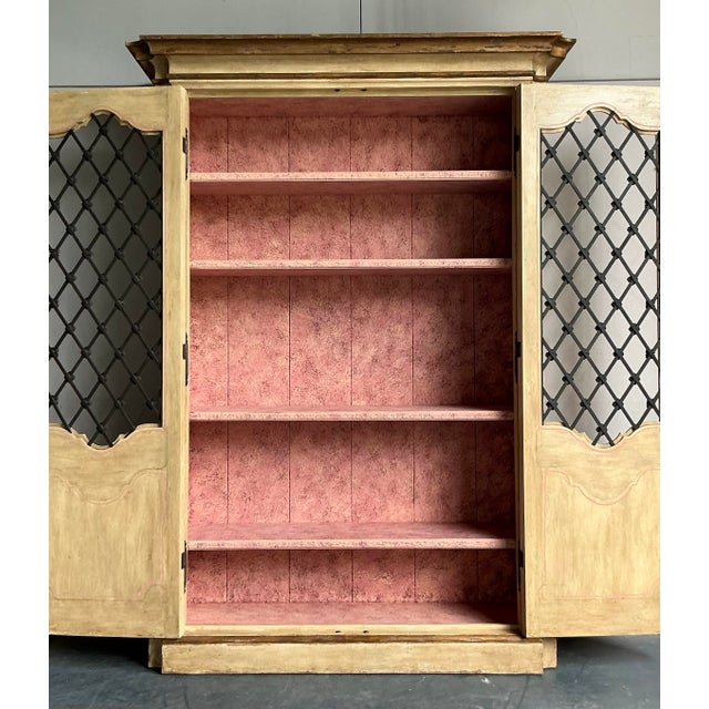 A piece of truly breathtaking scale and artistry, this monumental armoire brings the romantic grandeur of a European...