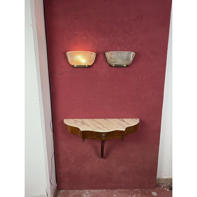 Set of two Art Deco wall lamps in brass and Murano glass in the style of Archimede Seguso, 1940s Good condition, glass...