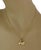 This is an authentic Tiffany & Co. necklace; it is crafted in 18k yellow gold with a fine polished finish. The pendant is...