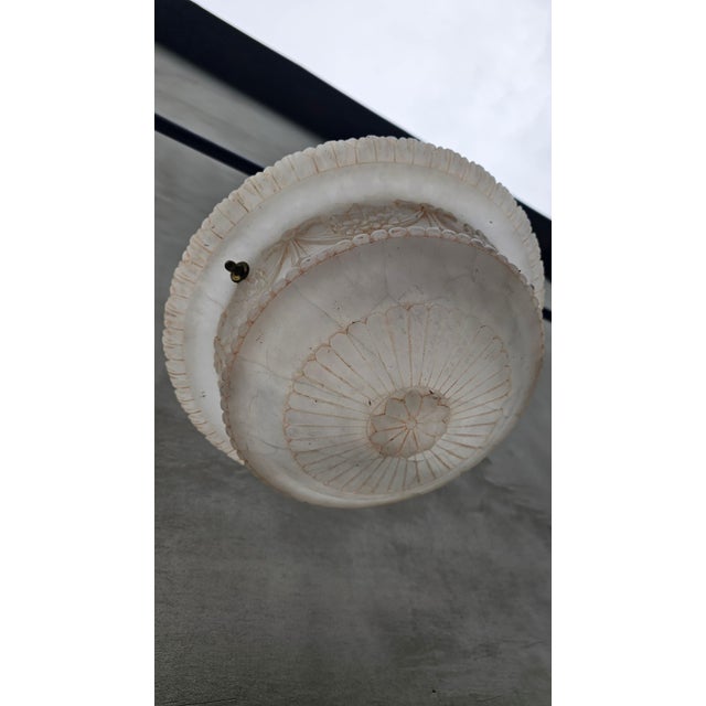 Art Deco alabaster chandelier, Dimensions: height 52 cm, diameter 40 cm. European Plug (up to 250V).The wiring of this...
