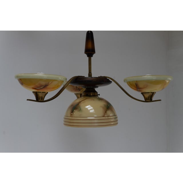 Danish Art Deco Brass Chandelier with Marbled Opaline Shades, 1930s. Stunning and cozy four light ceiling lamp made in...
