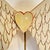 Carved Angel wings with a carved heart made from Antique wood and mounted on an old lamp base. One of a kind art by Folk...