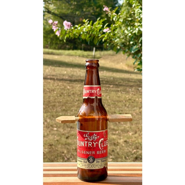 Folk Art Arrow Through Goetz Beer Bottle: Whimsical Display Piece For Sale - Image 10 of 10