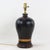 This unique vintage table lamp features a sophisticated baluster-shaped metal body with a deep black tole finish,...
