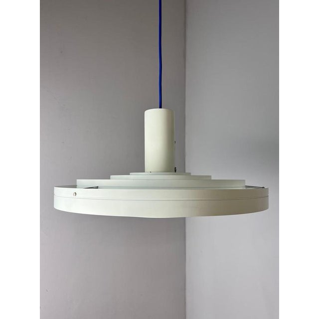 The Fibonacci pendant lamp is an absolute masterpiece of Danish lighting design. Designed in 1964 by architect Sophus...