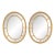 Pair of Beveled Glass Oval Neoclassical Style Gilded Mirrors For Sale