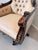 An elegant antique Empire-style swivel desk chair, beautifully crafted from solid mahogany with hand-carved gilt accents...