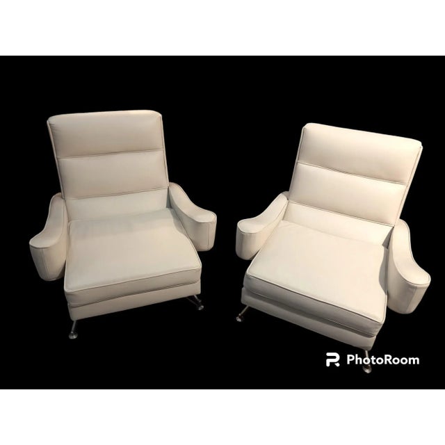 These armchairs feature a unique design with wide armrests that offer comfort and style. The sturdy and charming frame is...