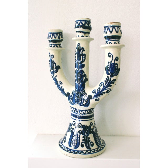 Exceptional earthenware candelabra hand painted by skilled artisans in Hungarian. Desirable Folk Art design.