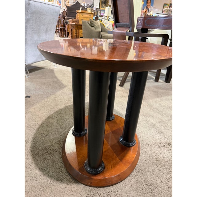 A sophisticated blend of classic craftsmanship and subtle Art Deco influence, this Lane side table is a refined accent...