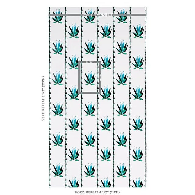 Part of the Peg Norriss Collection, Liz Nielsen’s Agave Stripe wallpaper features a stylized agave motif arranged in a...