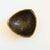 A hand made mid century pottery bowl. Triangular shape. Features a black and gold crackle glaze the the interior with a...