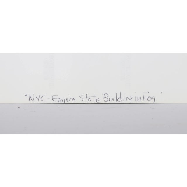 Charles Bah NYC Empire State Building in Fog, 1989 Photograph, signed, titled and numbered Edition: 19.75 in. x 15.75 in.