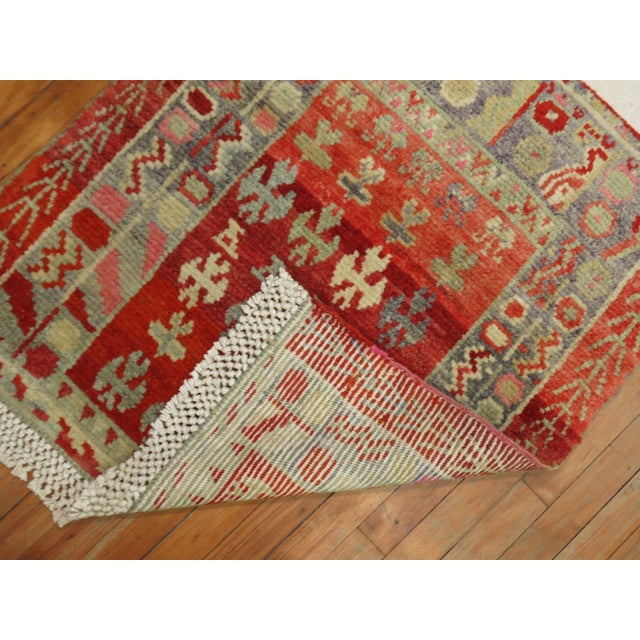 One of a kind decorative Vintage Turkish Anatolian rug. 1 end of rug has a Kilim end fringe which the weaver used with...