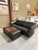 A sophisticated Stressless double ottoman by Ekornes, combining Scandinavian craftsmanship with versatile contemporary...