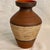 Beautiful vase made in the 1950's in Germany. Red fired clay with intricate textures. The mark on the Bottom of the vase...
