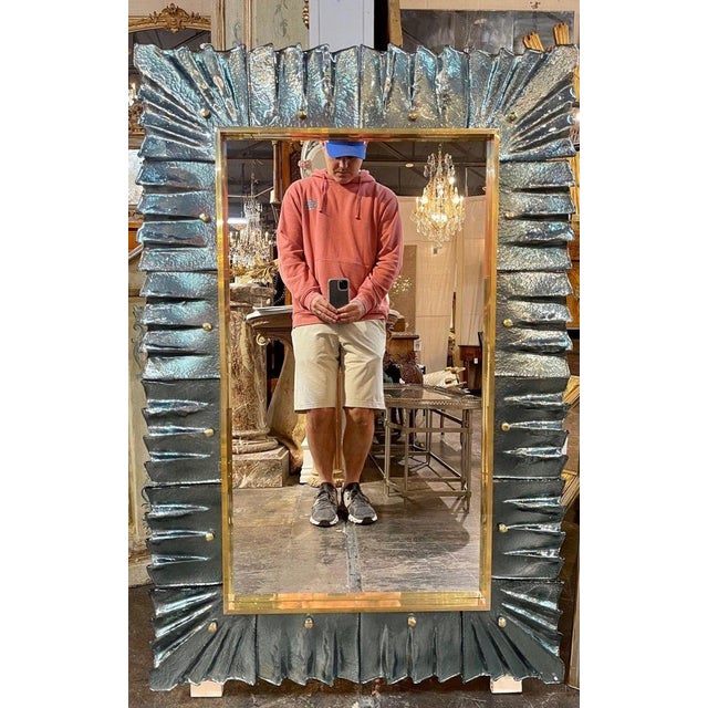 Modern Murano glass and brass mirror in Fontana green. Circa 2000. A fine addition to any home!