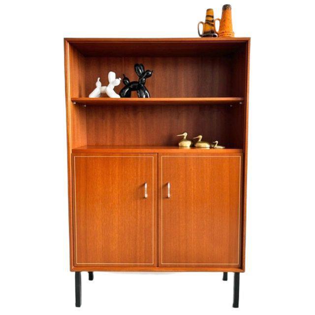 Vintage teak sideboard, a Danish-style bar cabinet from the Dutch brand Formule Meubelen, dating from the 1960s. This...
