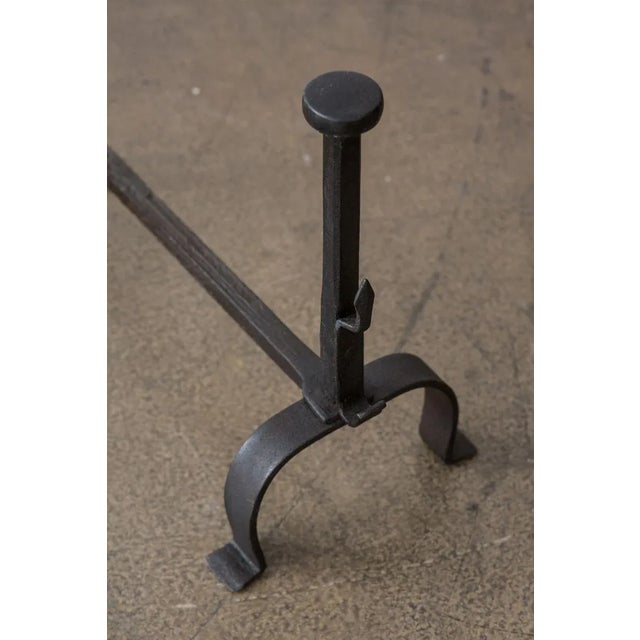 The andirons have a very nice age-related patina.