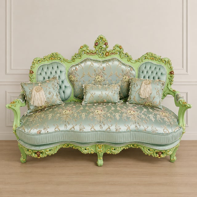 Bring a refined French-inspired presence to your interior with this ornate three-seater sofa, featuring a distinctive...