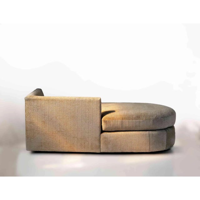 Vintage modern chaise lounge in textured tan chenille upholstery. The two cushions have removable zippered covers.