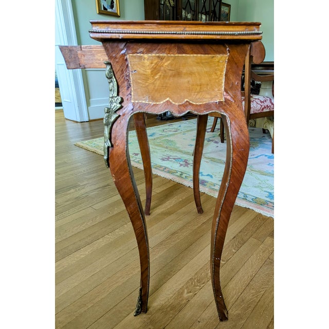 Patina! There is a lot of wear and tear on this adorable, well-made, still-sturdy French side table with two-toned...