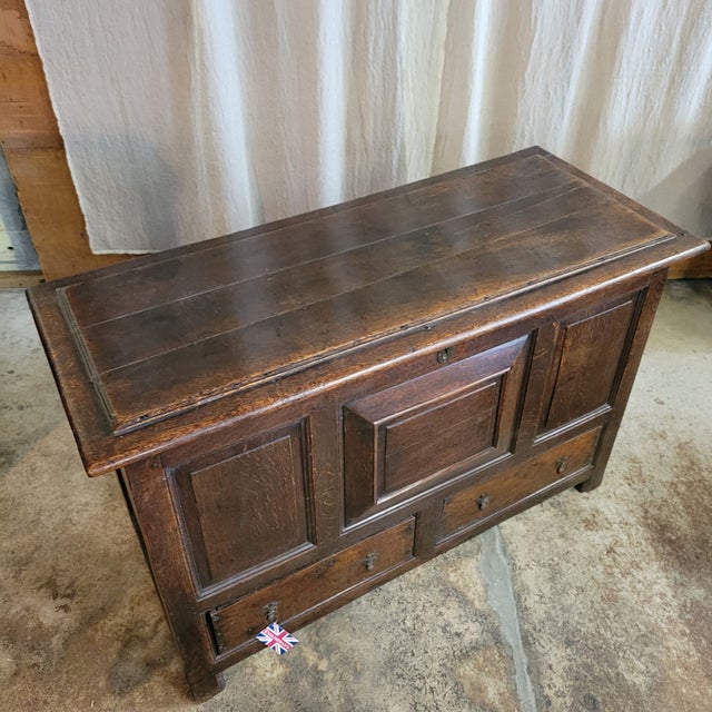 The character of the wood of this Oak Peroid Mule Chest/Trunk With Paneled Front and 2 Drawer Base is beautiful. It has...