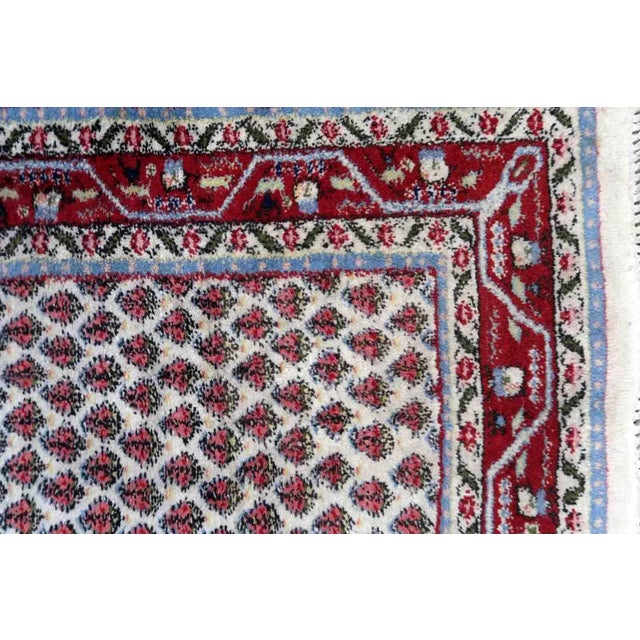 Handmade vintage Indian Seraband rug in original good condition. The rug has been made in wool in the end of 20th century....